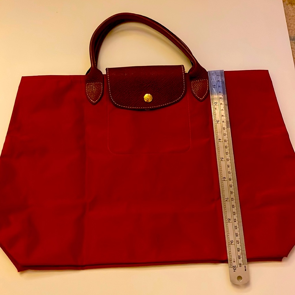 Longchamp le pliage medium hand tote - red, no zipper. Older style.